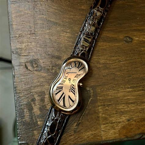 salvador dali rose gold strap.